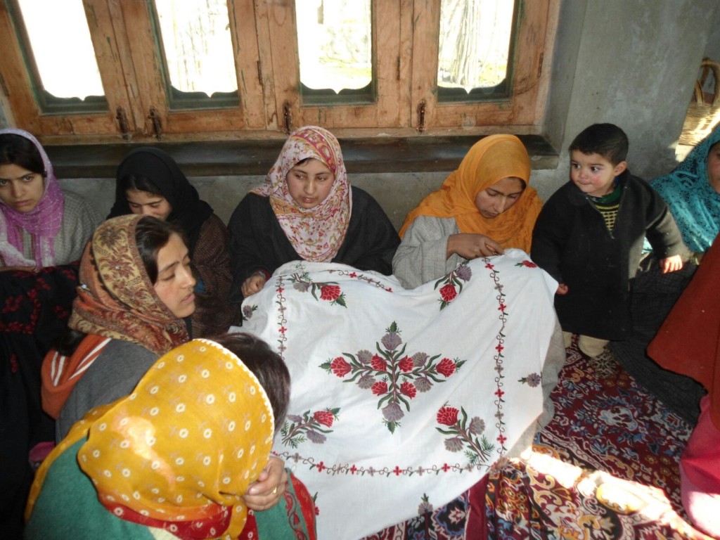 Sewing traditional Kashmiri embroidery